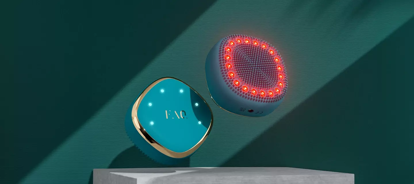 FAQ 301 red LED hair regrowth scalp massager shown from front and back on a dark background